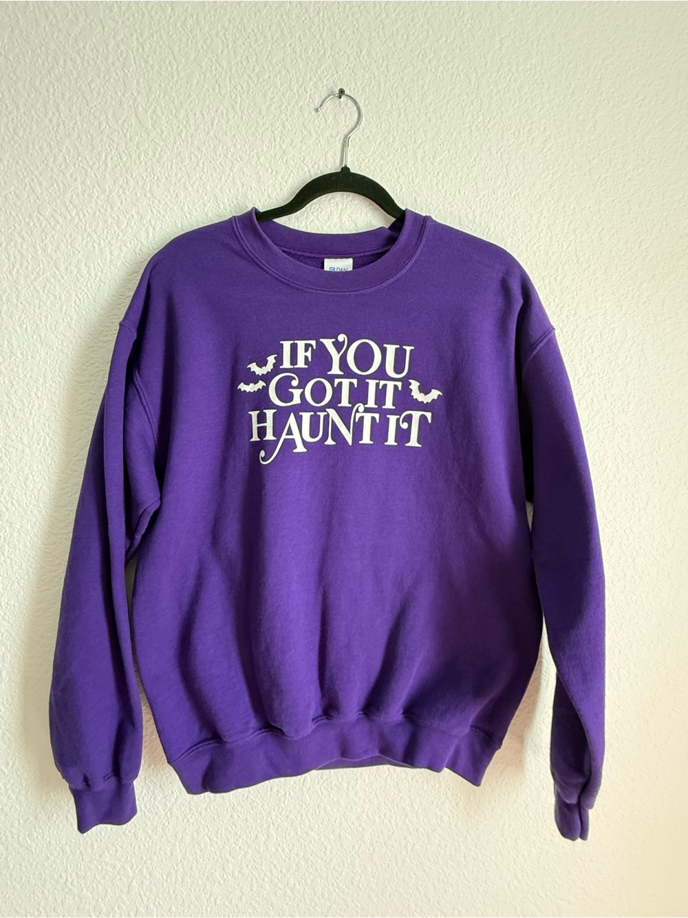 Gildan Purple Crewneck Sweatshirt with White 'If You Got It Haunt It' Graphic